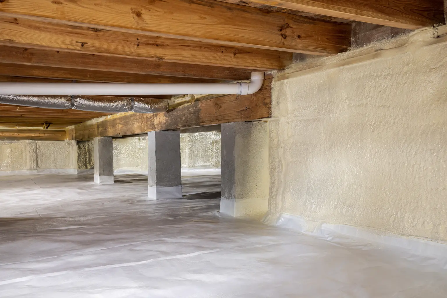 Closed-cell spray foam in a moisture-managed crawl space